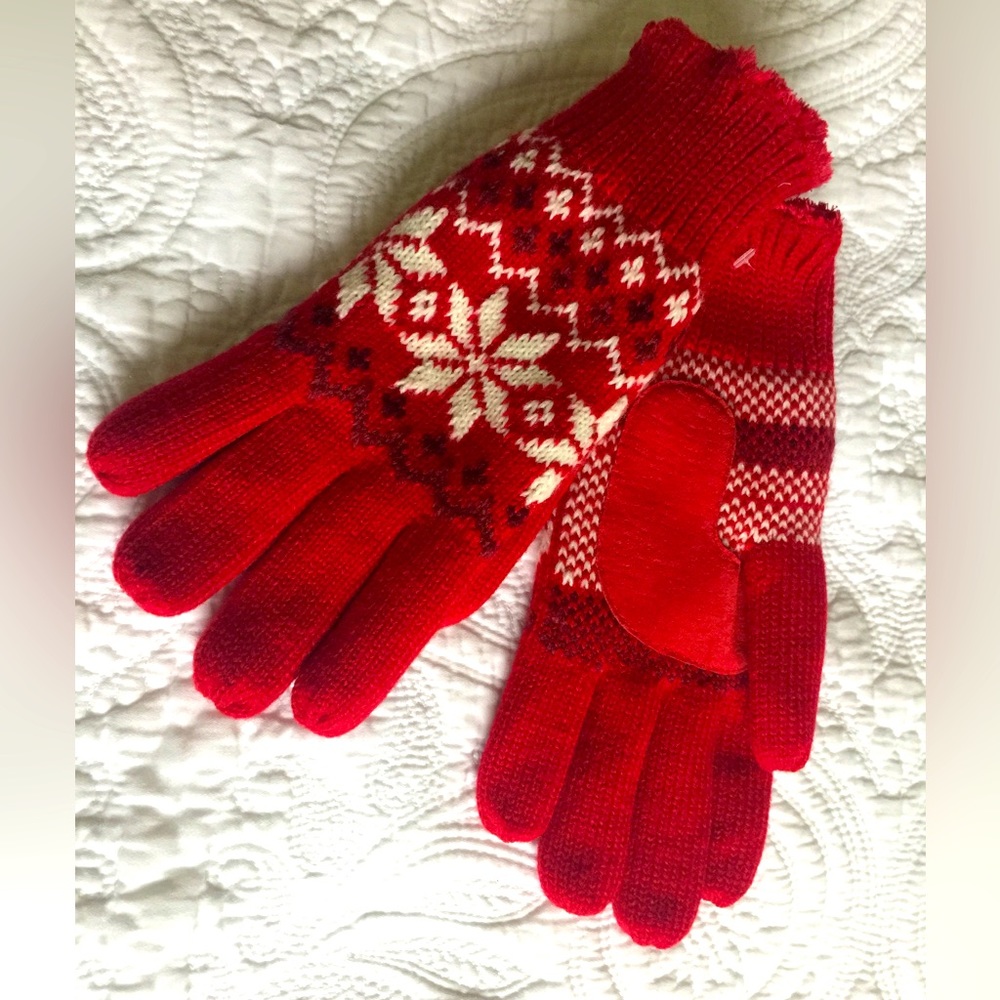 Bright red winter gloves white snow flakes pattern grab & hold fabric inner face